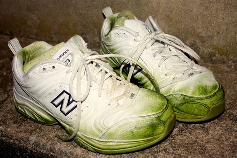 grass stained new balance shoes.